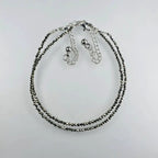 anklet for women on a light gray background