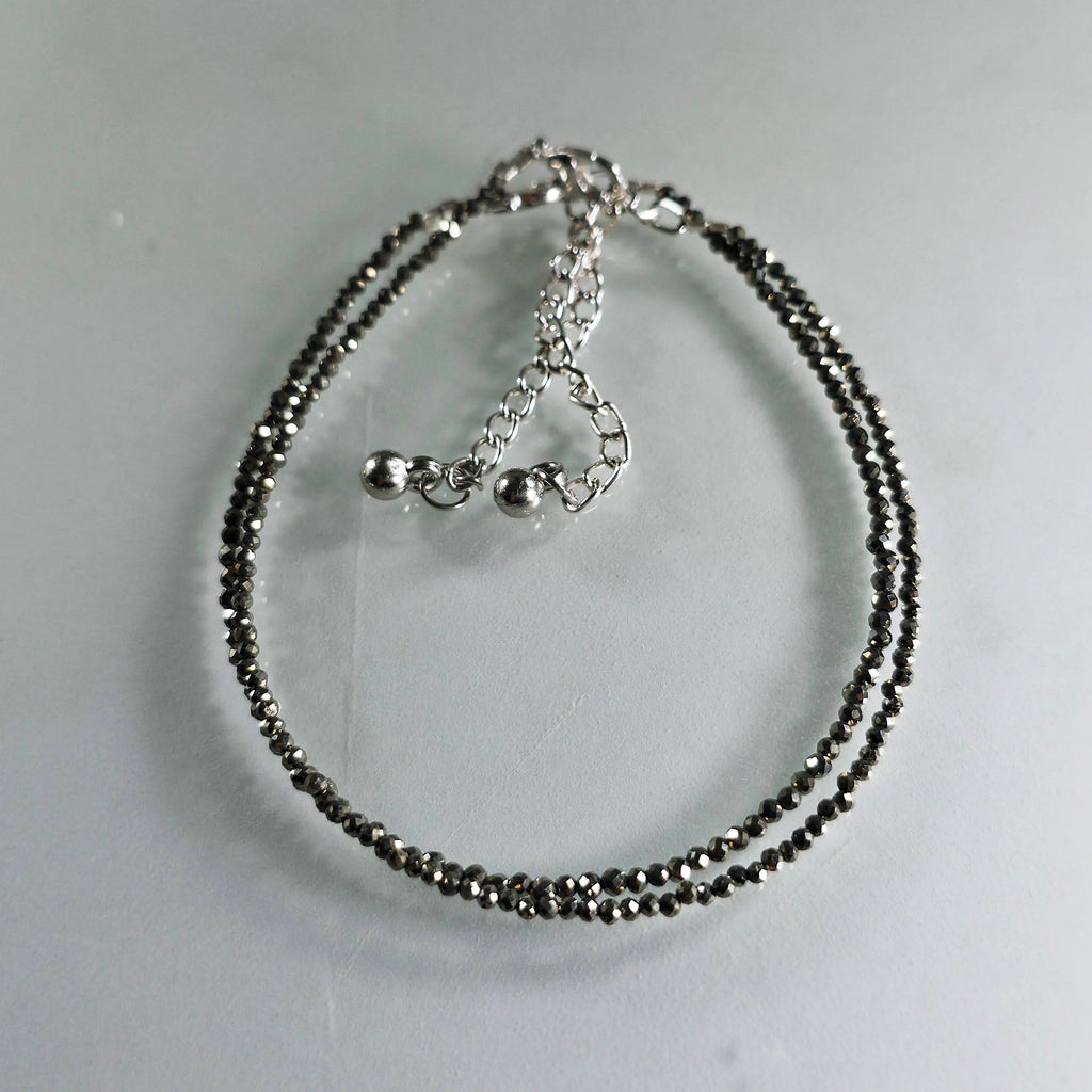 fashion anklet for women on a light grey background